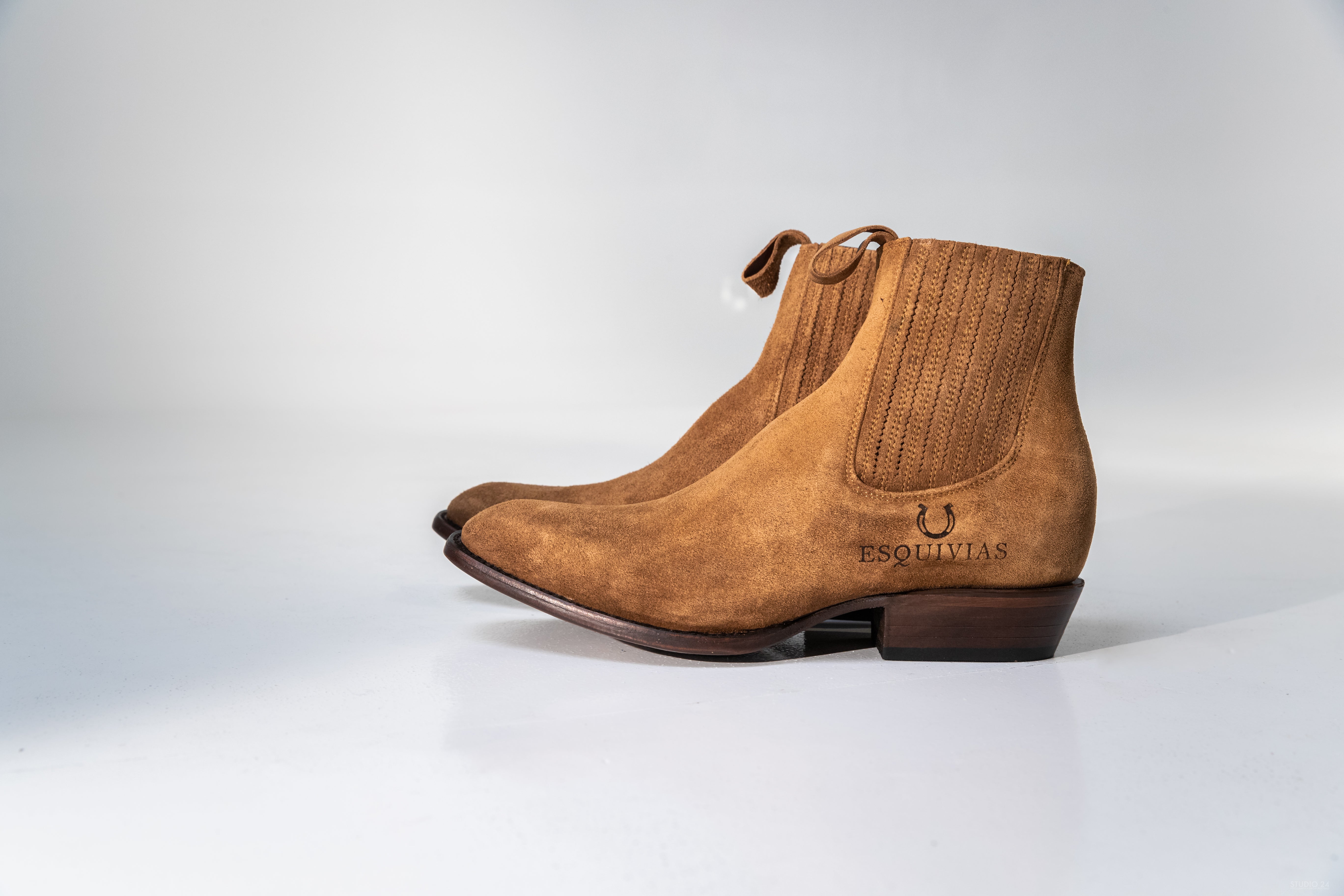 JOHN SUEDE