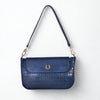 Adele blue crocodile-embossed leather shoulder bag, front view with gold horseshoe hardware