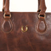 Close-up of gold-plated horseshoe hardware on Martha tote