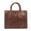 Martha tote bag in whiskey brown leather with gold horseshoe hardware